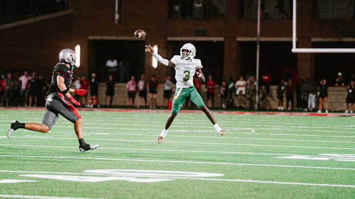 Carver Wolverines' QB throws a pass on Au 29, 2025 against Thompson