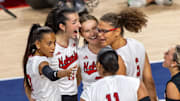 Members of the Husker Volleyball team celebrate after a Rebekah Allick kill in the second set of the first match of the AVCA First Serve vs. Pittsburg