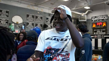 2025 four-star guard Kelvin Odih greets his supporters after he announces his commitment to West Virginia at Zuccolo Recreation Center on Wednesday evening.