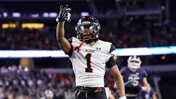 Hawk Patrick-Daniels celebrates one of his 3 TDs in Aledo's 51-8 UIL 5A-D1 state title repeat in Dec. 2023 at AT&T Stadium.
