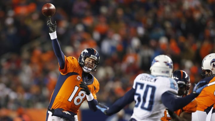 Dec 8, 2013; Denver, CO, USA; Denver Broncos quarterback Peyton Manning (18) throws the ball during the second half against the Tennessee Titans at Sports Authority Field at Mile High. The Broncos won 51-28.  Mandatory Credit: Chris Humphreys-USA TODAY Sports