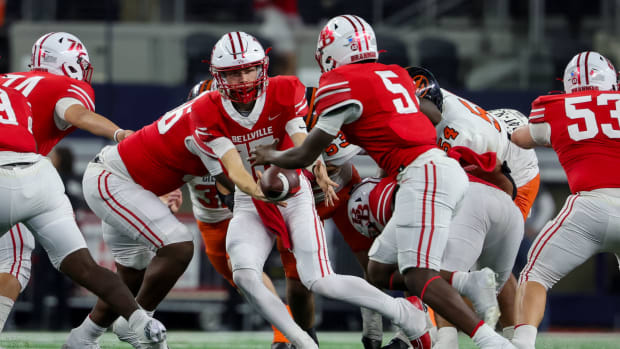 DD Murray (No. 5) readies to receive a handoff in the 2023 Texas state championship at AT&T Stadium in Arlington in Dec. 2023