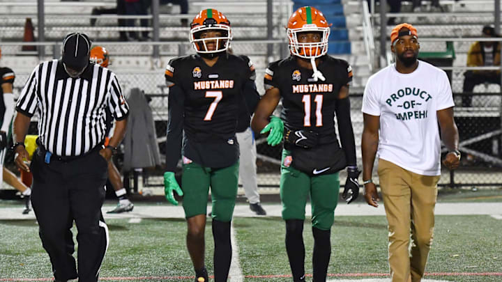 Morgan Park (Illinois) star receiver Nasir Rankin (No. 7) walks out for the coin toss. 