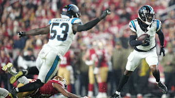 Nov 24, 2025; Santa Clara, California, USA; Carolina Panthers cornerback Jaycee Horn (8) catches an interception against the San Francisco 49ers during the first half at Levi's Stadium. 