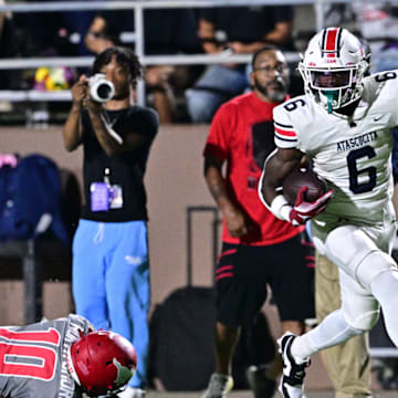 Atascocita running back Tory Blaylock, a 4-star Oklahoma, leaves a Westfield defender during the 2023 UIL season.