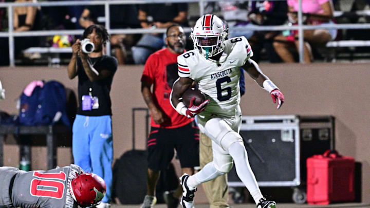 Atascocita running back Tory Blaylock, a 4-star Oklahoma, leaves a Westfield defender during the 2023 UIL season.