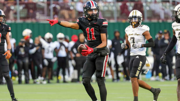 Daylan McCutcheon motions for a first down in a 2023 matchup with South Oak Cliff in a showdown of Texas high school powers.