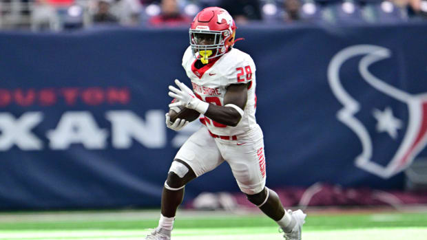 D'Andre Hardeman Jr. races through the open field during a win over Atascocita at NRG Stadium in the UIL regional semifinal p