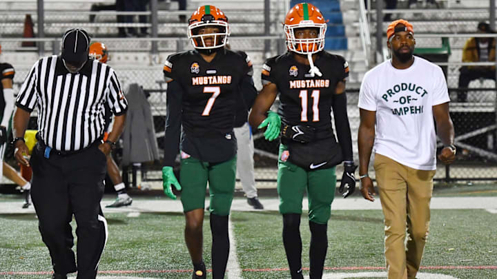 Morgan Park (Illinois) star receiver Nasir Rankin (No. 7) walks out for the coin toss. 