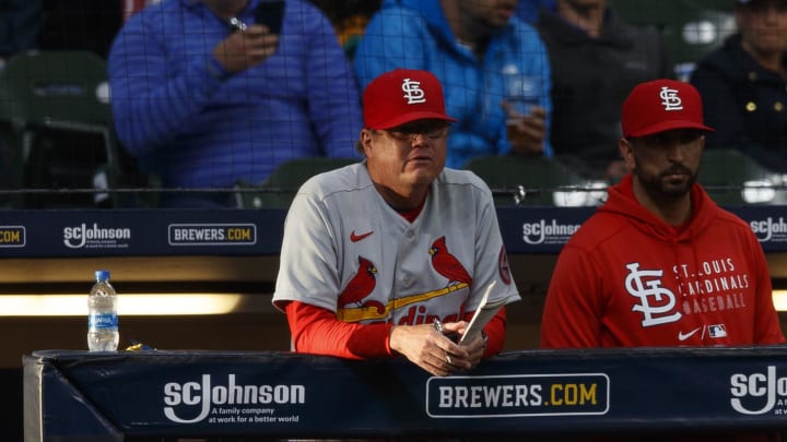 May 11, 2021; Milwaukee, Wisconsin, USA;  St. Louis Cardinals manager Mike Schildt (8) looks on from the dugout during the second inning against the Milwaukee Brewers at American Family Field. Mandatory Credit: Jeff Hanisch-USA TODAY Sports