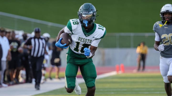 Ethan Feaster catches a touchdown during a blowout win over South Oak Cliff in the 2023 Texas high school football season. 