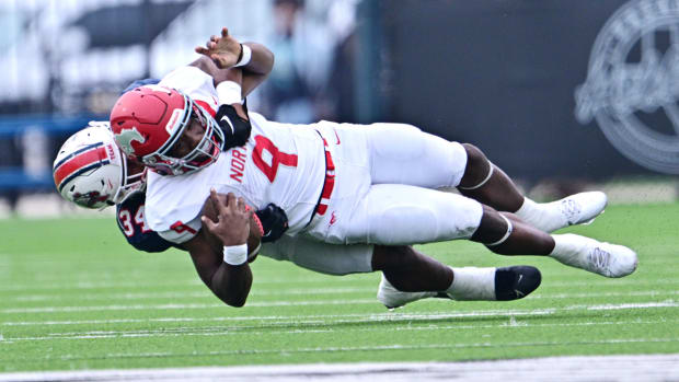 North Shore QB Kaleb Bailey is taken down during a showdown with Atascocita in 2023.