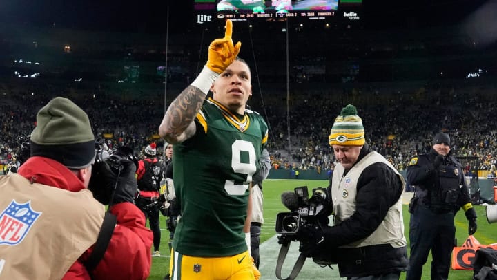 Green Bay Packers wide receiver Christian Watson (9) acknowledges fans after their 31-28 overtime win against the Dallas Cowboys on Sunday, Nov. 13, 2022 at Lambeau Field in Green Bay.