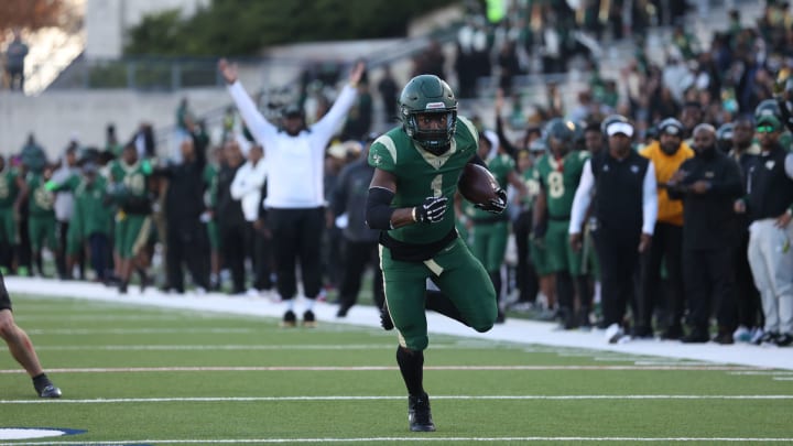 Deondrae Riden barrels toward the endzone in a 6A Division II Texas state semifinal win over Southlake Carroll in November 2023.