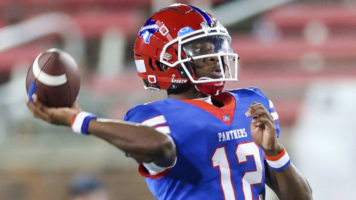 Keelon Russell throws a pass during a win over South Oak Cliff to open the 2023 Texas high school football season. 