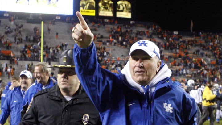 Oct 17, 2009; Auburn, AL, USA; Kentucky Wildcats head coach Rich Brooks gestures to fans after the Wildcats beat the Auburn Tigers 21-14 at Jordan Hare Stadium in Auburn.  Mandatory Credit: John Reed-Imagn Images