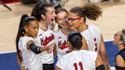Members of the Husker Volleyball team celebrate after a Rebekah Allick kill in the second set of the first match of the AVCA First Serve vs. Pittsburg