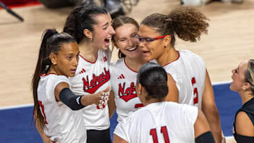 Members of the Husker Volleyball team celebrate after a Rebekah Allick kill in the second set of the first match of the AVCA First Serve vs. Pittsburg