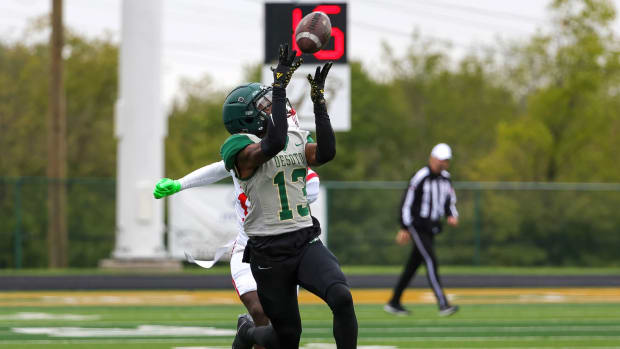 DeSoto's Daylon Singleton hauls in a pass during an upset of nationally ranked Duncanville (Texas) on Oct. 28, 2023.