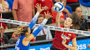 Nebraska opposite hitter Virginia Adriano attacks against Creighton outside hitter Ava Martin. She recorded a season-best 13 kills agaisnt the Bluejays.