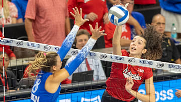 Nebraska opposite hitter Virginia Adriano attacks against Creighton outside hitter Ava Martin. She recorded a season-best 13 kills agaisnt the Bluejays.
