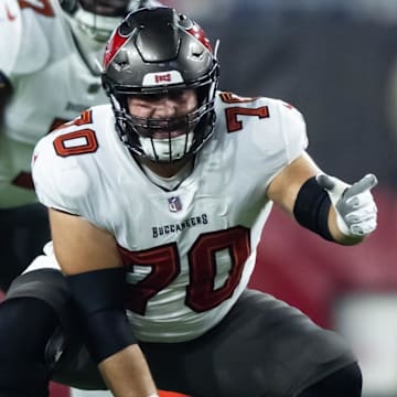 Dec 25, 2022; Glendale, Arizona, USA; Tampa Bay Buccaneers offensive tackle Robert Hainsey (70) against the Arizona Cardinals at State Farm Stadium. Mandatory Credit: Mark J. Rebilas-Imagn Images