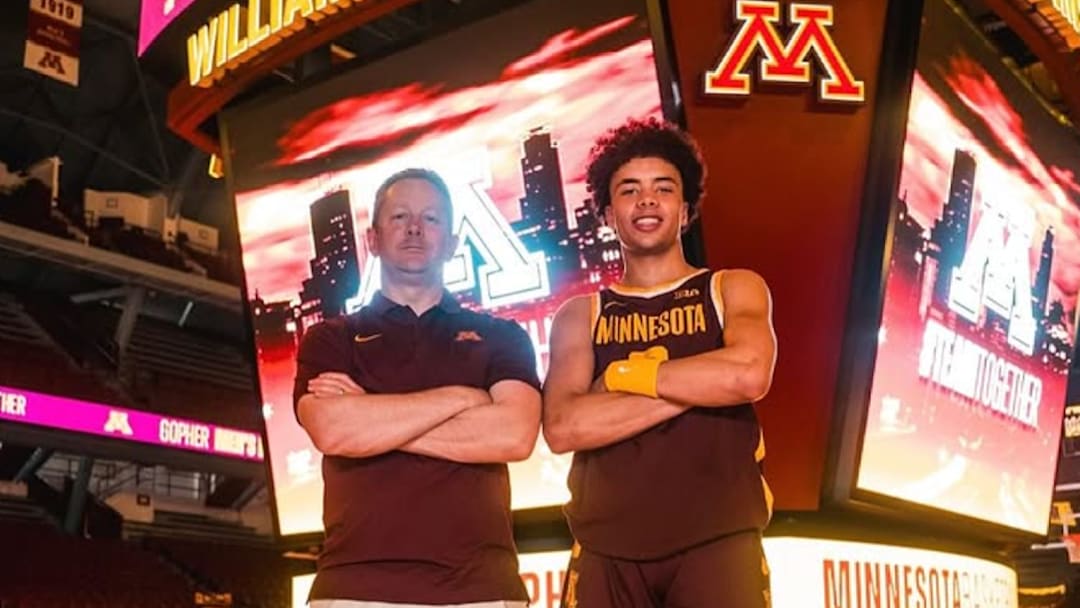 Cedric Tomes with Gophers head coach Niko Medved. 