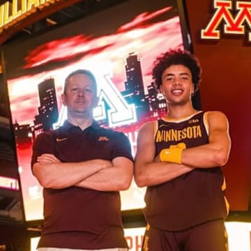 Cedric Tomes with Gophers head coach Niko Medved. 