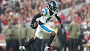 Nov 24, 2025; Santa Clara, California, USA; Carolina Panthers cornerback Jaycee Horn (8) catches an interception against the San Francisco 49ers during the first half at Levi's Stadium.