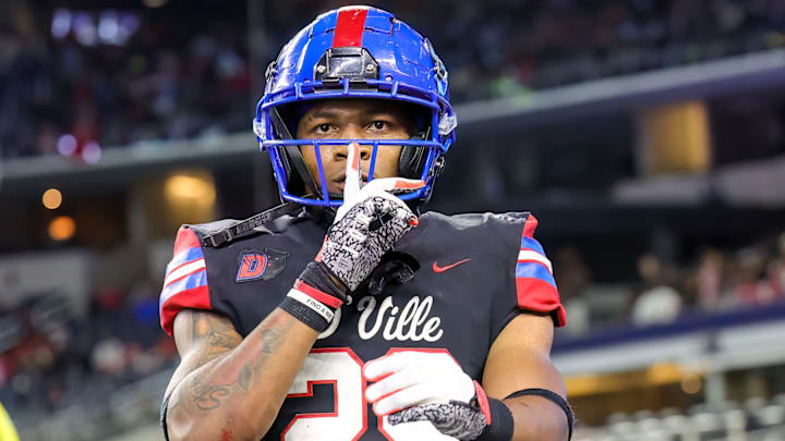 Duncanville's Caden Durham celebrates a touchdown during the 2022 UIL (Texas) 6A Division I state championship.