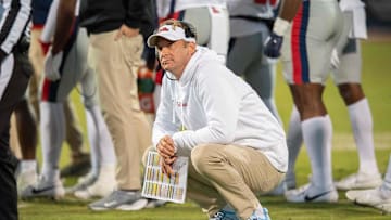 Ole Miss coach Lane Kiffin looks up at the scoreboard during a time out in second half of the Egg Bowl at Davis Wade Stadium in Starkville, Miss., Thursday, Nov. 23, 2023.