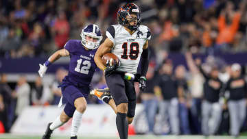 Kaydon Finley breaks loose during Aledo's 5A Division I Texas state title win over Smithson Valley in December 2023.