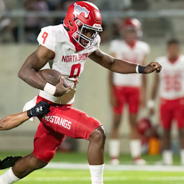 North Shore's Kaleb Bailey races past a Westfield defender in a win during the 2023 Texas high school football season.