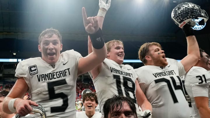 Austin Vandegrift players celebrate a win over San Antonio Harlan in the 2022 UIL (Texas) 6A Division II regional finals.