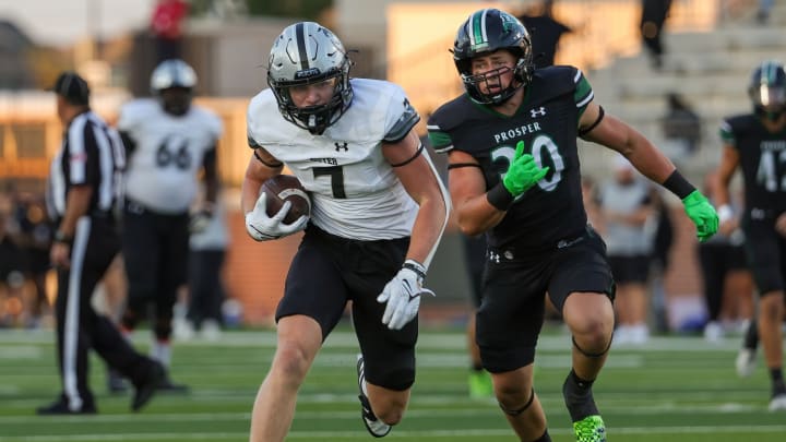 Denton Guyer's Jackson Shockley gains ground against Prosper in a Texas high school football showdown in 2023.