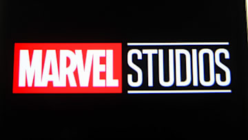 In this photo illustration a Marvel Studios logo is seen on...