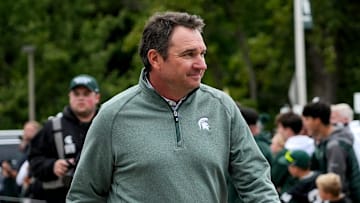 Michigan State's head coach Jonathan Smith walks past fans before the football game against Boston College on Saturday, Sept. 6, 2025, at Spartan Stadium in East Lansing.