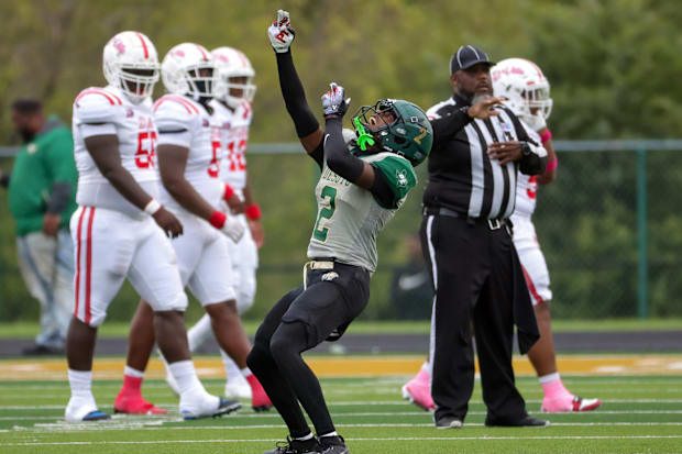 A DeSoto player reacts to a momentous upset of undefeated Duncanville in a rivalry in 2023.