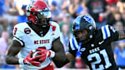 Sep 20, 2025; Durham, North Carolina, USA;  North Carolina State Wolfpack wide receiver Terrell Anderson (9) runs the ball during the second quarter against Duke Blue Devils cornerback Landan Callahan (21) at Wallace Wade Stadium. Mandatory Credit: Zachary Taft-Imagn Images
