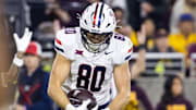 Nov 28, 2025; Tempe, Arizona, USA; Arizona Wildcats tight end Cameron Barmore (80) celebrates after scoring a touchdown against the Arizona State Sun Devils in the second half during the 99th Territorial Cup at Mountain America Stadium. Mandatory Credit: Mark J. Rebilas-Imagn Images