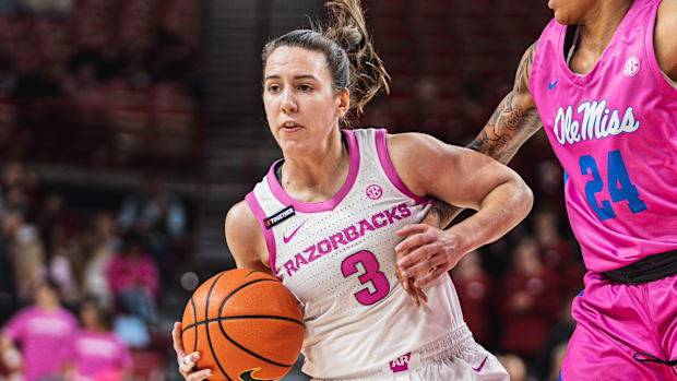 Arkansas Guard Izzy Higginbottom treats the ball 