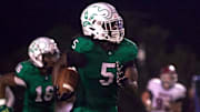 Ashbrook's Caleb Gordon sprints toward the end zone