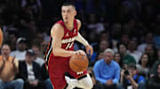 Nov 24, 2025; Miami, Florida, USA; Miami Heat guard Tyler Herro (14) brings the ball up the court against the Dallas Mavericks in the first half at Kaseya Center. Mandatory Credit: Jim Rassol-Imagn Images