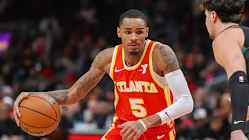 Jan 13, 2024; Atlanta, Georgia, USA; Atlanta Hawks guard Dejounte Murray (5) drives to the basket