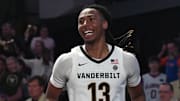 Mar 9, 2024; Nashville, Tennessee, USA; Vanderbilt Commodores guard Malik Presley (13) celebrates after a win against the Florida Gators at Memorial Gymnasium. Mandatory Credit: Christopher Hanewinckel-Imagn Images