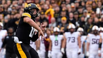 Iowa Hawkeyes quarterback Mark Gronowski (11) passes the ball during a football game against the Minnesota Golden Gophers Oct. 25, 2025 at Kinnick Stadium in Iowa City, Iowa.