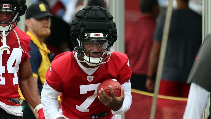 Jul 25, 2024; Tampa, FL, USA;  Tampa Bay Buccaneers running back Bucky Irving (7) works out during training camp at AdventHealth Training Center. Mandatory Credit: Kim Klement Neitzel-USA TODAY Sports