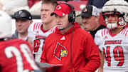White Louisville’s head coach Jeff Brohm watches his team against Red Louisville in the Spring Game Friday night at L&N Stadium.