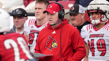 White Louisville’s head coach Jeff Brohm watches his team against Red Louisville in the Spring Game Friday night at L&N Stadium.