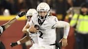 Cincinnati Bearcats quarterback Brendan Sorsby runs the football against the Iowa State Cyclones.